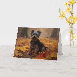 Tarjeta Yorkipoo en hojas de otoño caídas inspiran