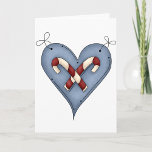 Tarjetas de felicitación Candy Cane Heart<br><div class="desc">Muestra amor y romance en las valentinas o en cualquier momento del año con este corazón de caña de caramelos muy bien diseñado. Este diseño tiene dos latas de caramelo colocadas sobre un fondo en forma de corazón. Este diseño cardíaco de caña de caramelos se ve genial en estas tarjetas...</div>