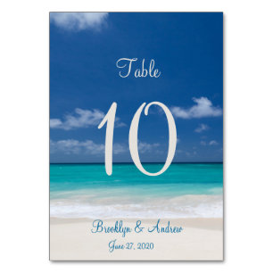 Tarjetas de la mesa de boda de la playa azul