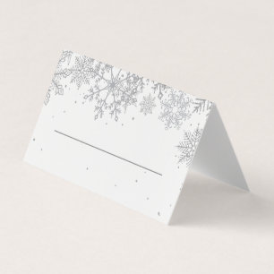 Tarjetas de lugar con copo de nieve plateado