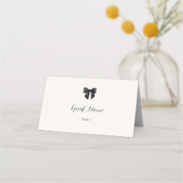 Tarjetas de lugar dobladas con lazo negro elegante