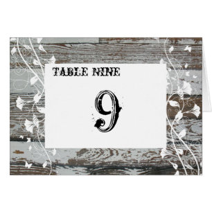 Tarjetas de madera viejas del número de la tabla