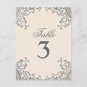 Tarjetas de mesa de boda elegantes en plata y beig