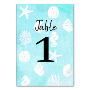 Tarjetas de número de mesa de boda de conchas de p