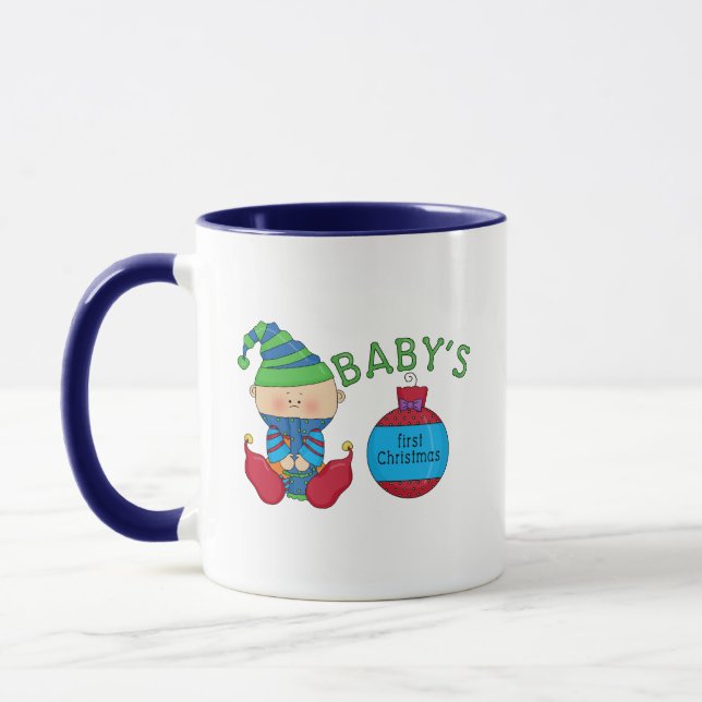 Taza 1.ª camiseta y regalo de elfo Navidades (Izquierda)