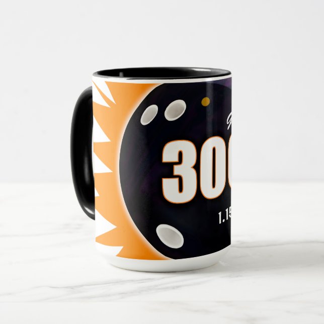 Taza 300 Naranja de juego y negro, con fecha lanzada, (Anverso izquierdo)