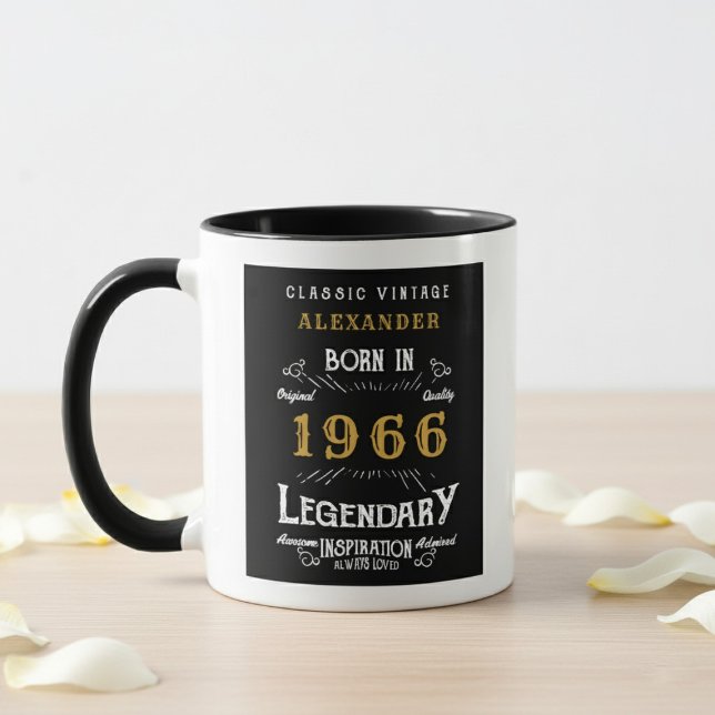 Taza 60th Birthday 1966 Legend Retro Black Personalized (born 1966 birthday mug. Background is wood table, white wall and flower petals.)
