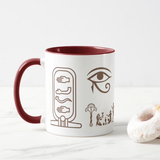 Taza A ceramic mug with an ancient Egyptian design  (Con donut)