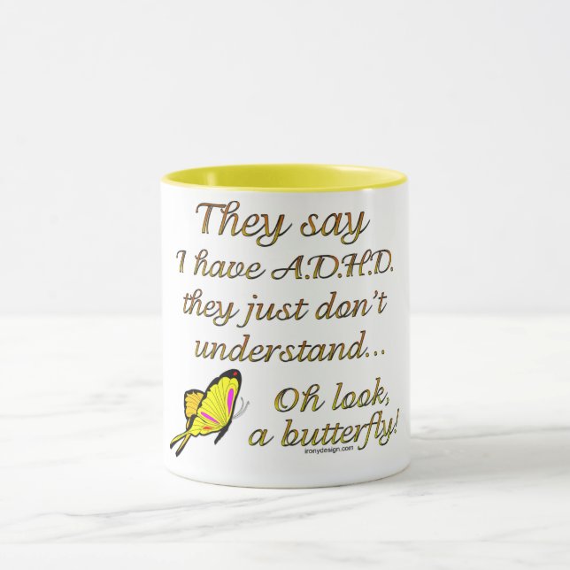 Taza A.D.H.D. Humor de la mariposa (Centro)