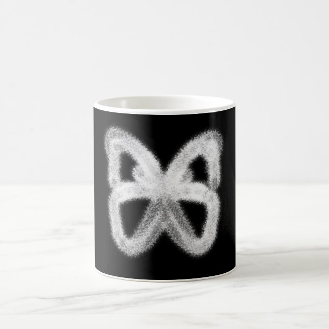 Taza activada calor de la mariposa que aparece (Centro)