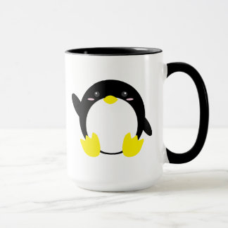 Taza adorable del pingüino