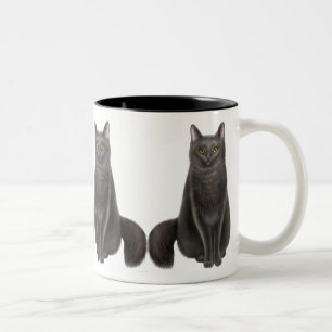 Taza afortunada de los gatos negros