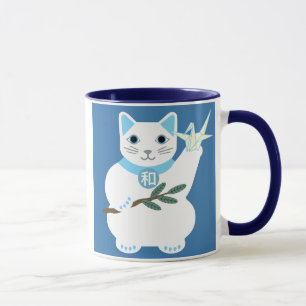 Taza afortunada del gato de la paz