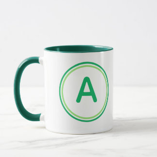 Taza Alfabeto de letra redonda diseño de círculo verde