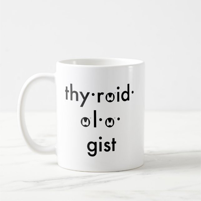 Taza americana del thyroidologist de la asociación (Izquierda)