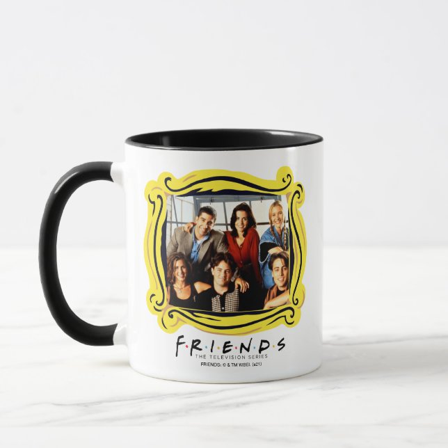 Taza AMIGOS™ | Sentada en fundición en el apartamento d (Izquierda)
