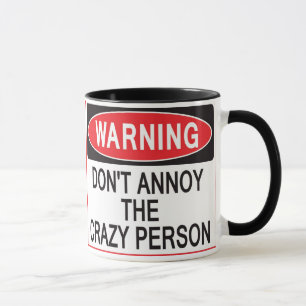taza amonestadora de la persona loca