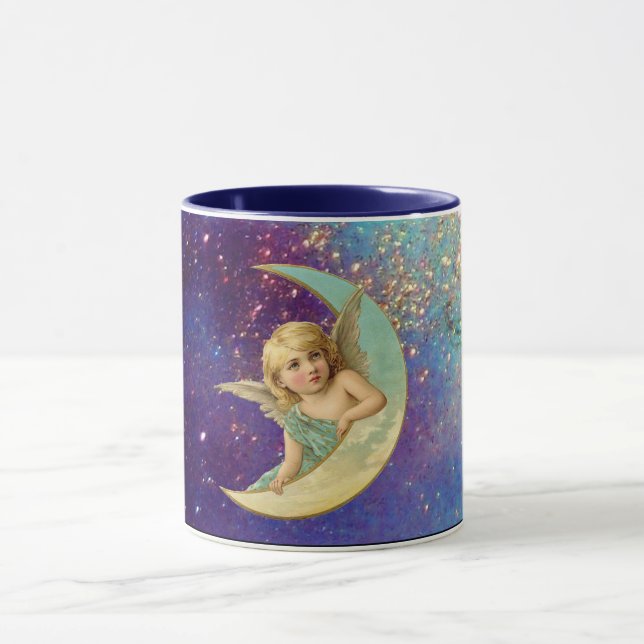 TAZA ÁNGEL DE LA LUNA EN GOLPE AZUL AMARILLO (Centro)