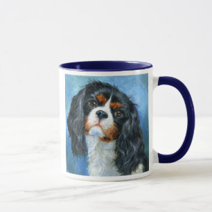 Taza arrogante del perro de aguas de rey Charles