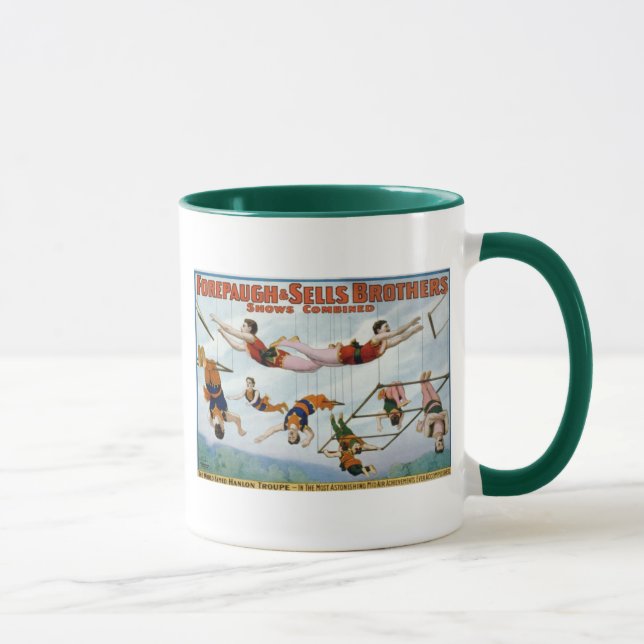 Taza Artistas de trapecio/hermanos de Forepaugh y de (Derecha)