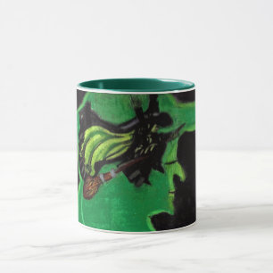 TAZA ASISTENTE DE OZ VOLANDO BRAZO DE BRAZA