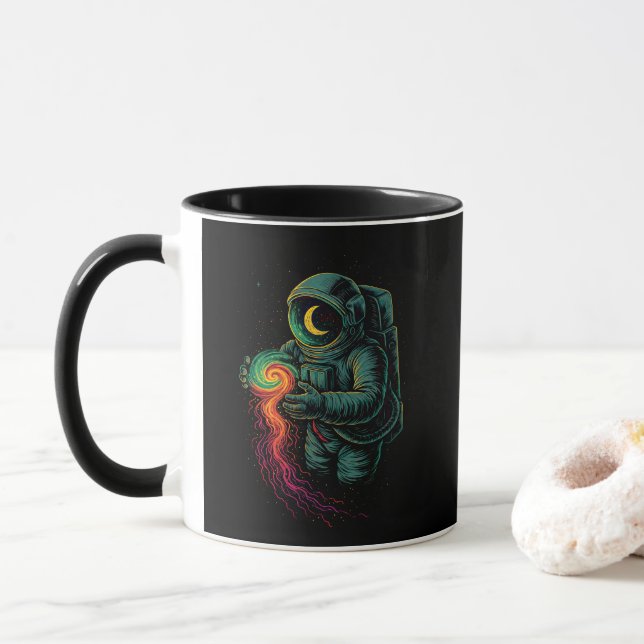 Taza Astronaut Holding a Cosmic Spiral (Con donut)