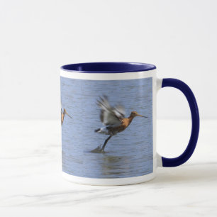 Taza atada negro de la agachadiza