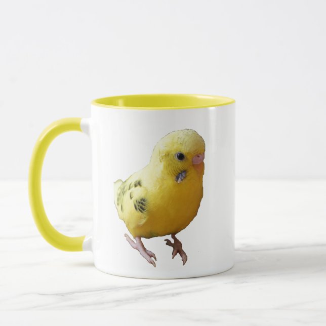 Taza Ave Mascota amigable de paracaídas amarillo lindo. (Izquierda)