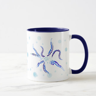 Taza azul del jardín del pulpo