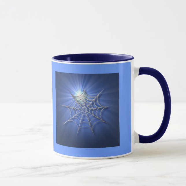 Taza azul del Web de araña del resplandor solar (Derecha)