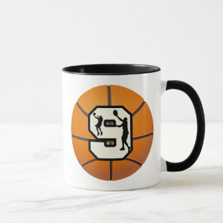 Taza Baloncesto y jugador del número 9