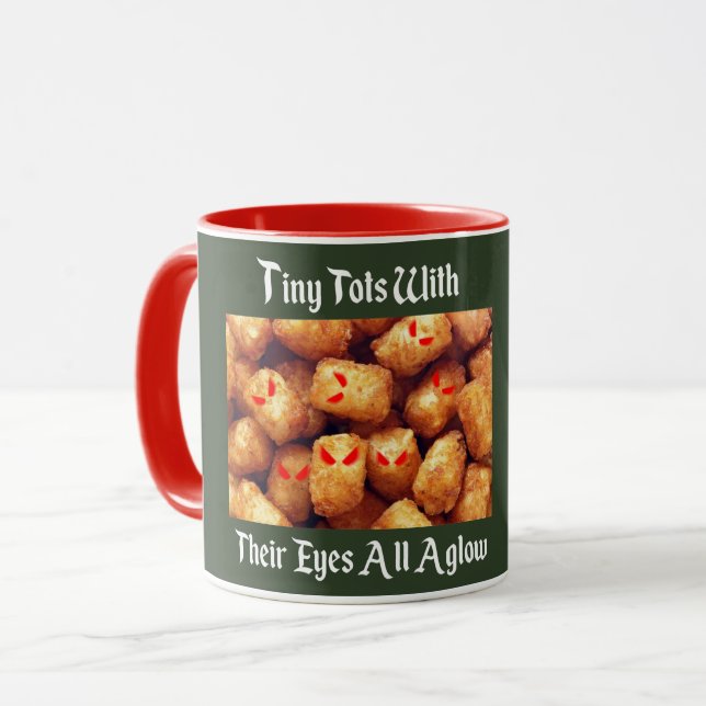 TAZA BEBÉS MINÚSCULOS CON SUS OJOS TODO ENCENDIDOS (Anverso izquierdo)