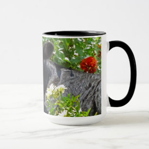 Taza Becerro del bebé en las flores
