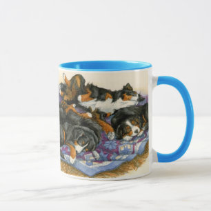 Taza Berners en un edredón