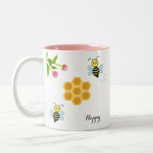 Taza Bicolor Abejas felices, flores rosadas y panal de miel