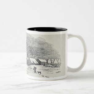 Taza Bicolor Acercamiento de un pueblo en el invierno
