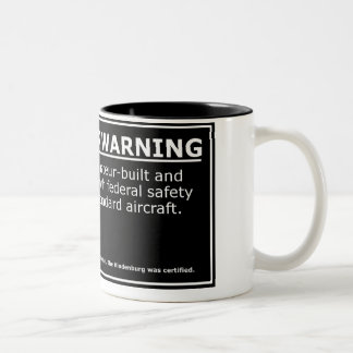 TAZA BICOLOR ADVERTENCIA DEL PASAJERO