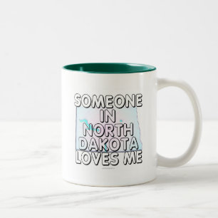 Taza Bicolor Alguien en Dakota del Norte me ama