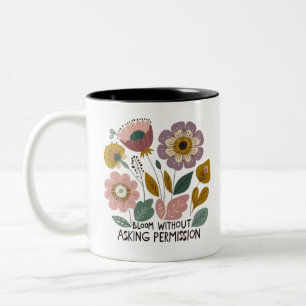 Taza Bicolor Boho floral design with the phrase “Bloom without