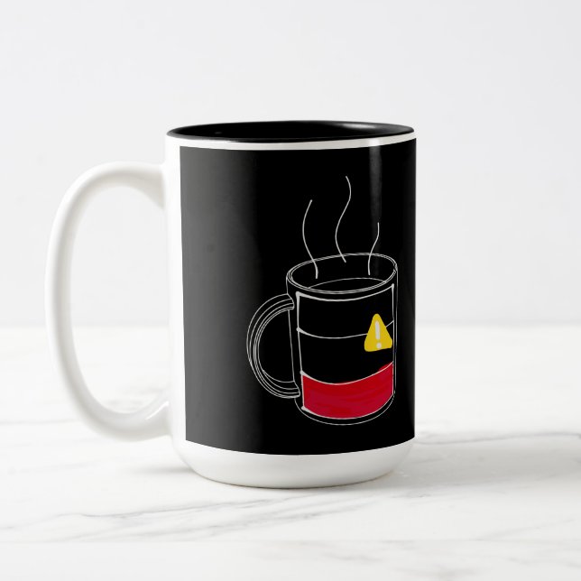 Taza Bicolor Café Críticamente bajo (Izquierda)