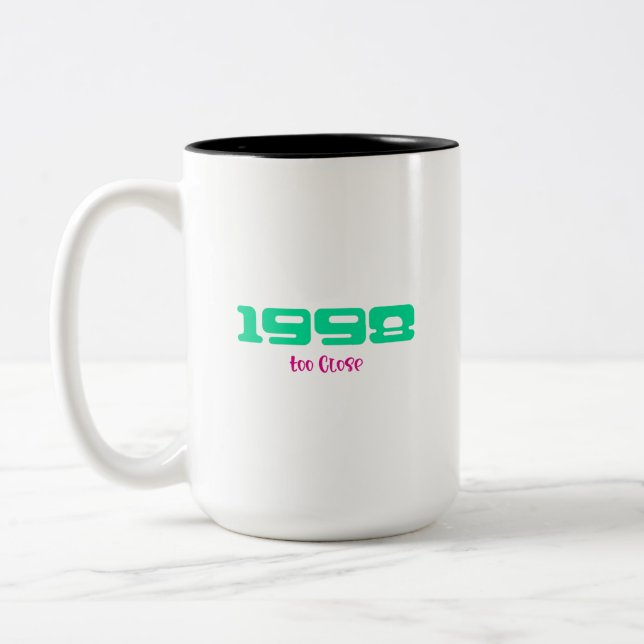 Taza Bicolor Canción principal de 1998 (Izquierda)