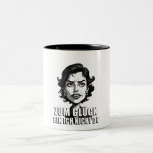 Taza Bicolor Caricatura con cita de «Por suerte…»