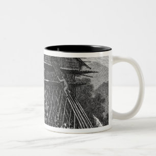 Taza Bicolor Casa en el pueblo de Arfak de Memiwa, Nueva Guinea