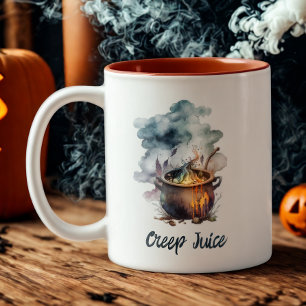 Taza Bicolor Cauldron Halloween es una divertida acuarela que m
