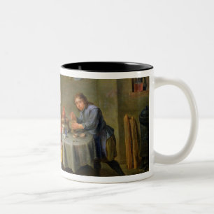 Taza Bicolor Cirujano que tiende al pie de un viejo hombre