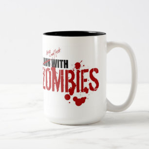 TAZA BICOLOR CORRO CON LOS ZOMBIS