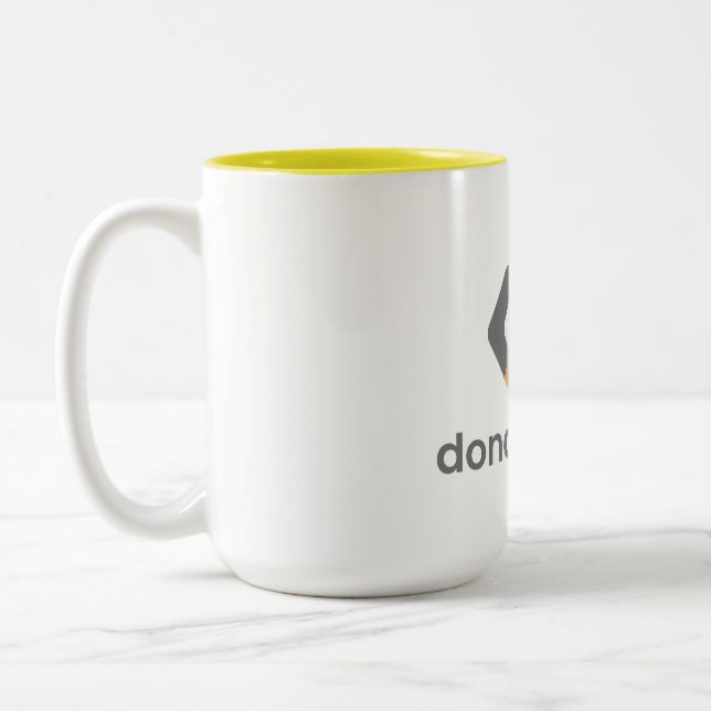 Taza Bicolor donar:código Mug (Izquierda)