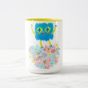 Taza Bicolor El Feliz Garabato Azul en un Lecho de Flores