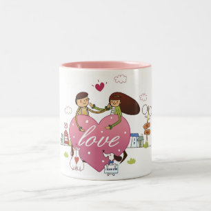 Taza Bicolor El primer de un par que lleva a cabo un corazón
