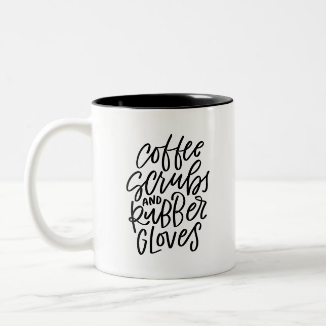 Taza Bicolor Escudos de café y guantes de goma (Izquierda)